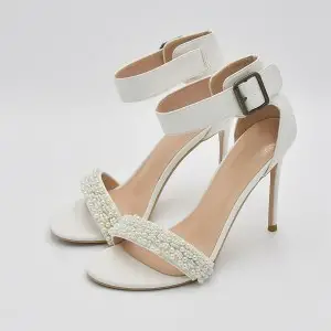 feminine ivory pearled stiletto heel bridal sandals