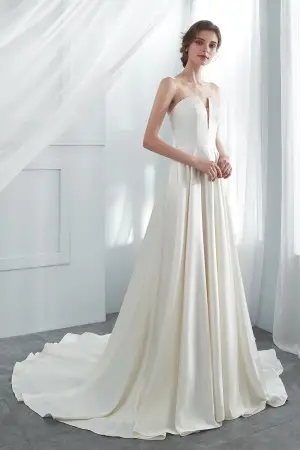 modern ivory satin spring wedding gown with chapel train
