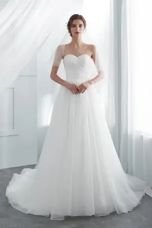 soft white tulle strapless sweetheart classic bridal gown