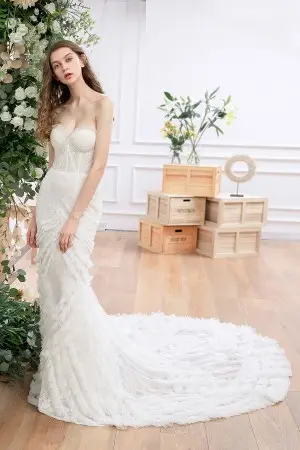 airy ruffled tulle details long train lace wedding dress
