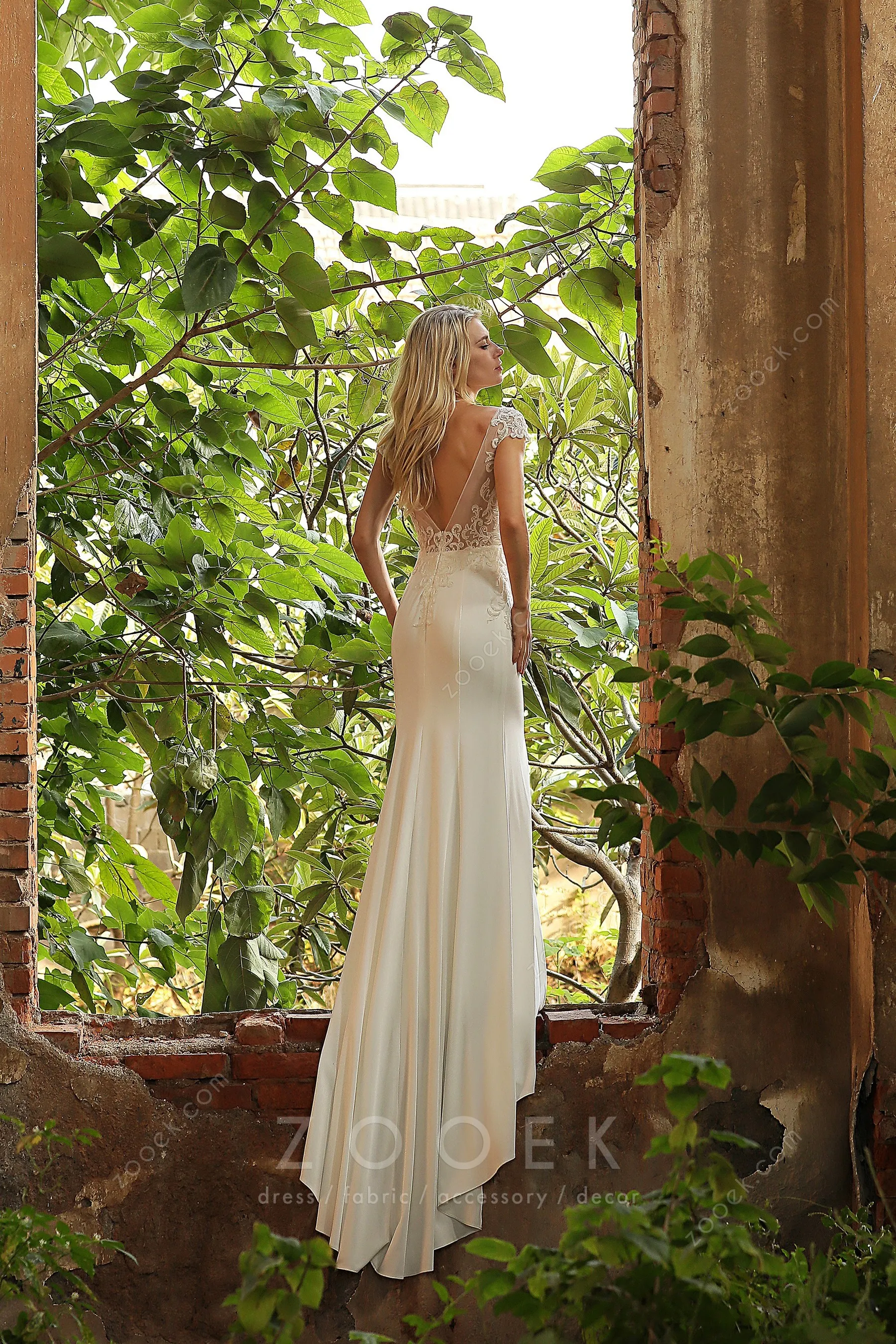 elegant vintage ivory mermaid bridal gown with Queen Anne neckline