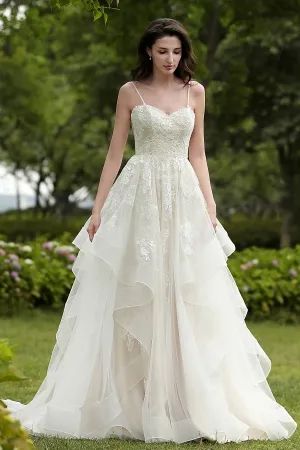 flounced champagne lace bridal gown with spaghetti straps
