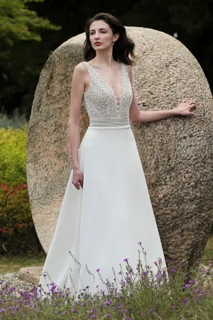 stunning sexy lace and satin plunging neck bridal gown