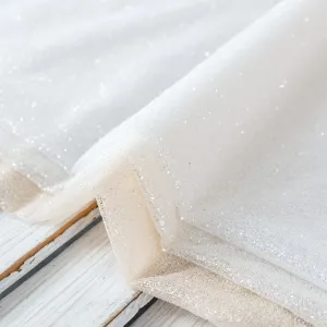 shimmering glitter glued crisp lightweight tulle fabric