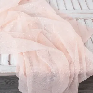 shining white powder spraying glued peach tulle fabric