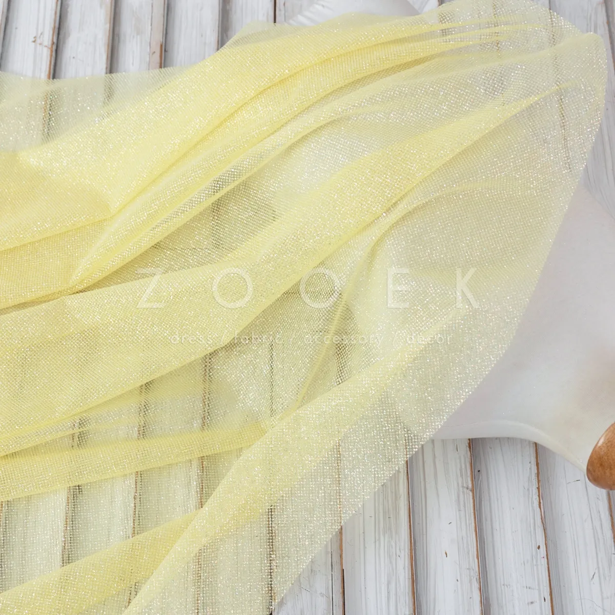 shimmer glued on corn colored soft mesh tulle