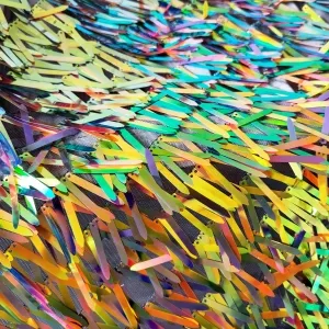 iridescent golden light sword shaped sequins by the yard