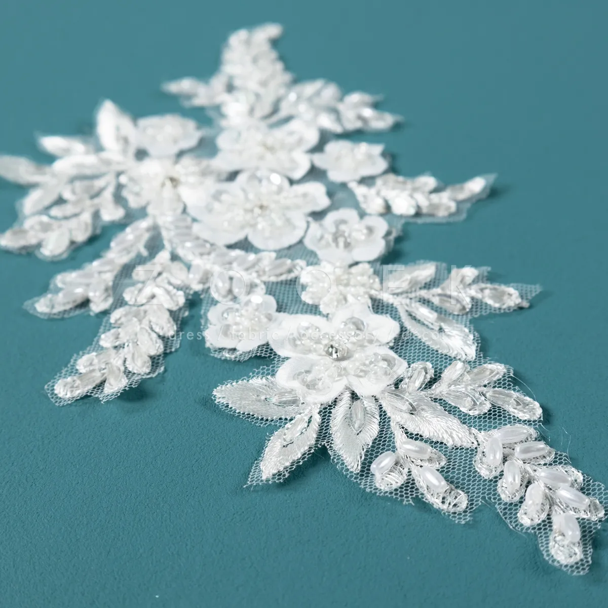 elegant flower motif with intricate beadwork