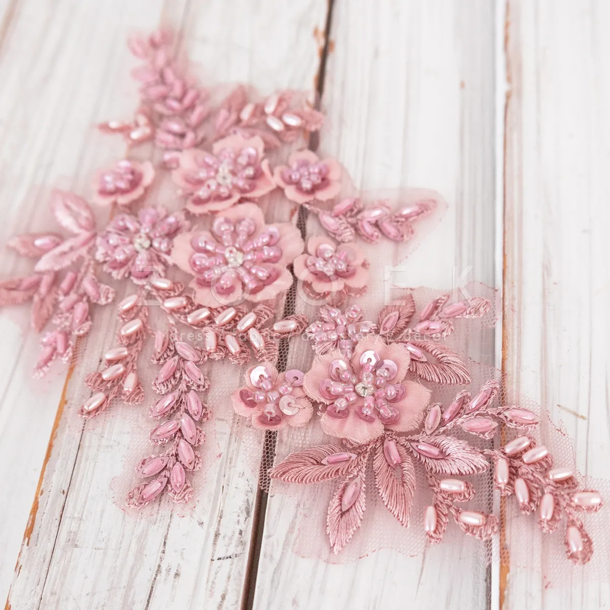 pair of elegant pink beaded lace motifs