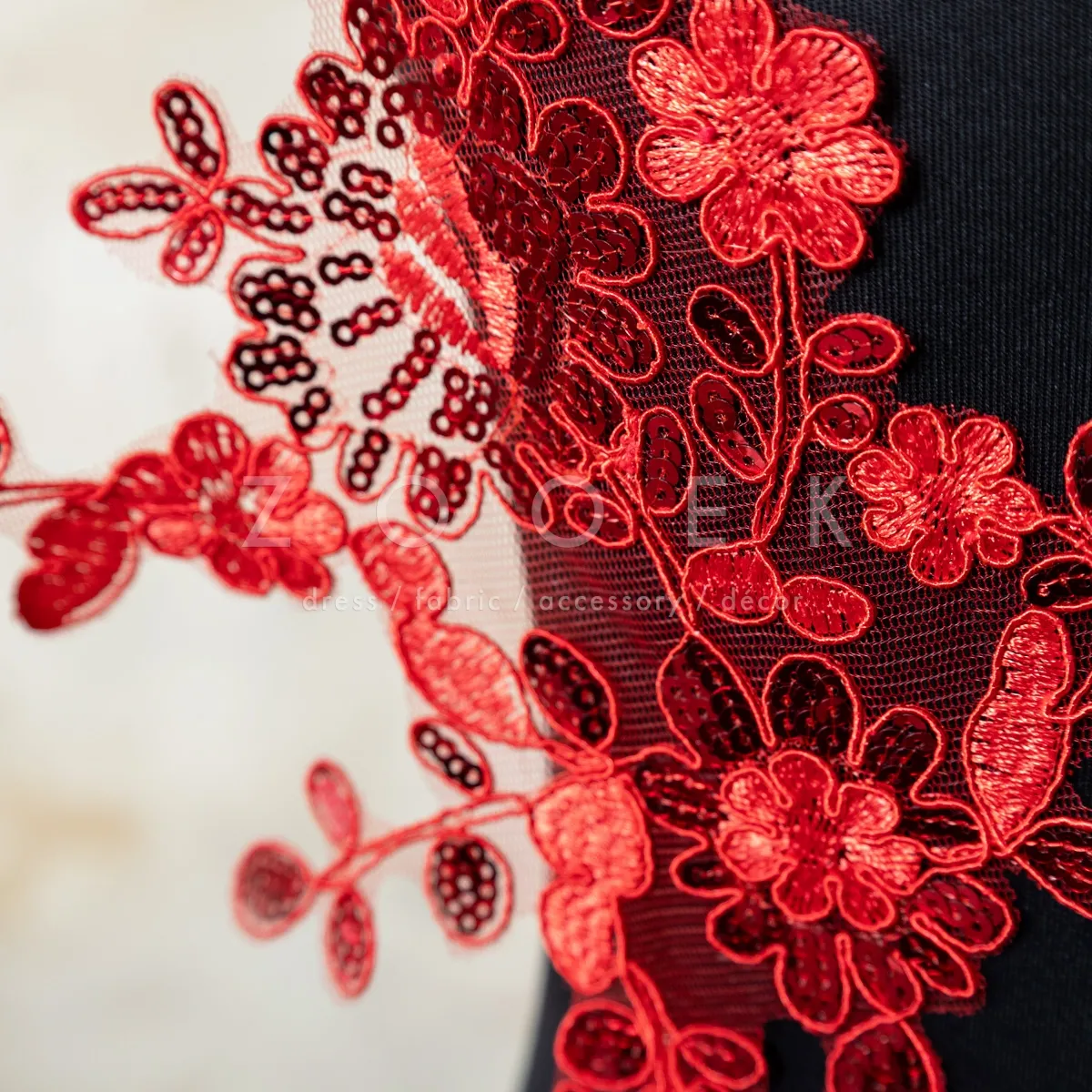 radiant sequinned red floral lace motif