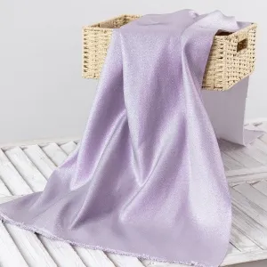 glittering pale lilac lurex fabric with metallic sparkle