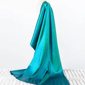 iridescent green and aqua lurex fabric for shiny dresses