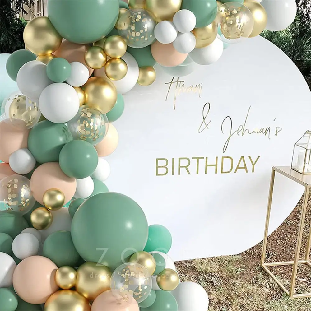 confetti green white gold and nude colors of uneven size balloons